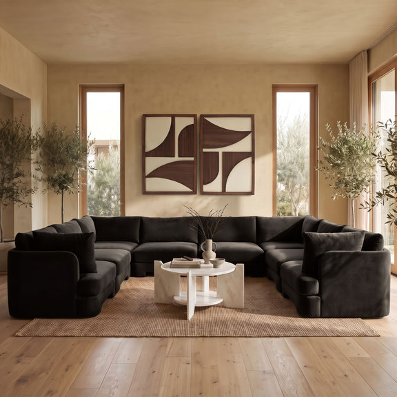 Dark charcoal velvet performance sectional with deep seats and rounded arms, U-shaped corner seating