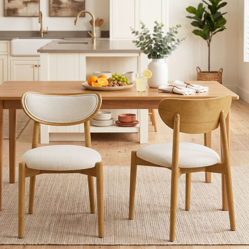 Beige upholstered dining chairs with curved backs, shown from front and back