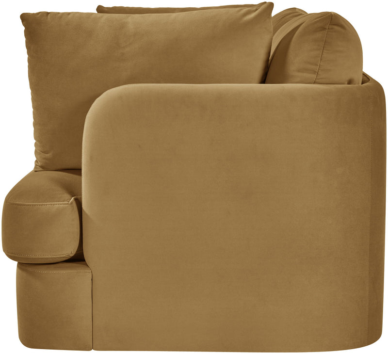 Beige velvet upholstered loveseat with rolled arms and back cushions, chaise-style seat