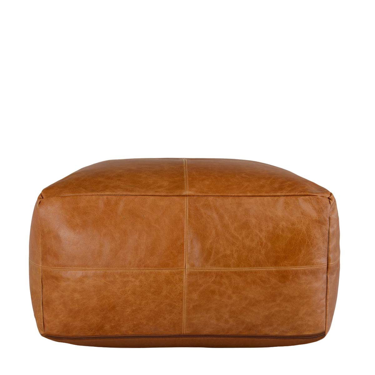 Chestnut leather pouf with flat top and centered seam lines.