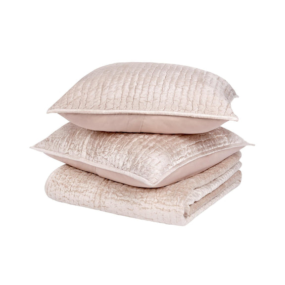 Light beige velvet quilt set with coordinating shams and pillows