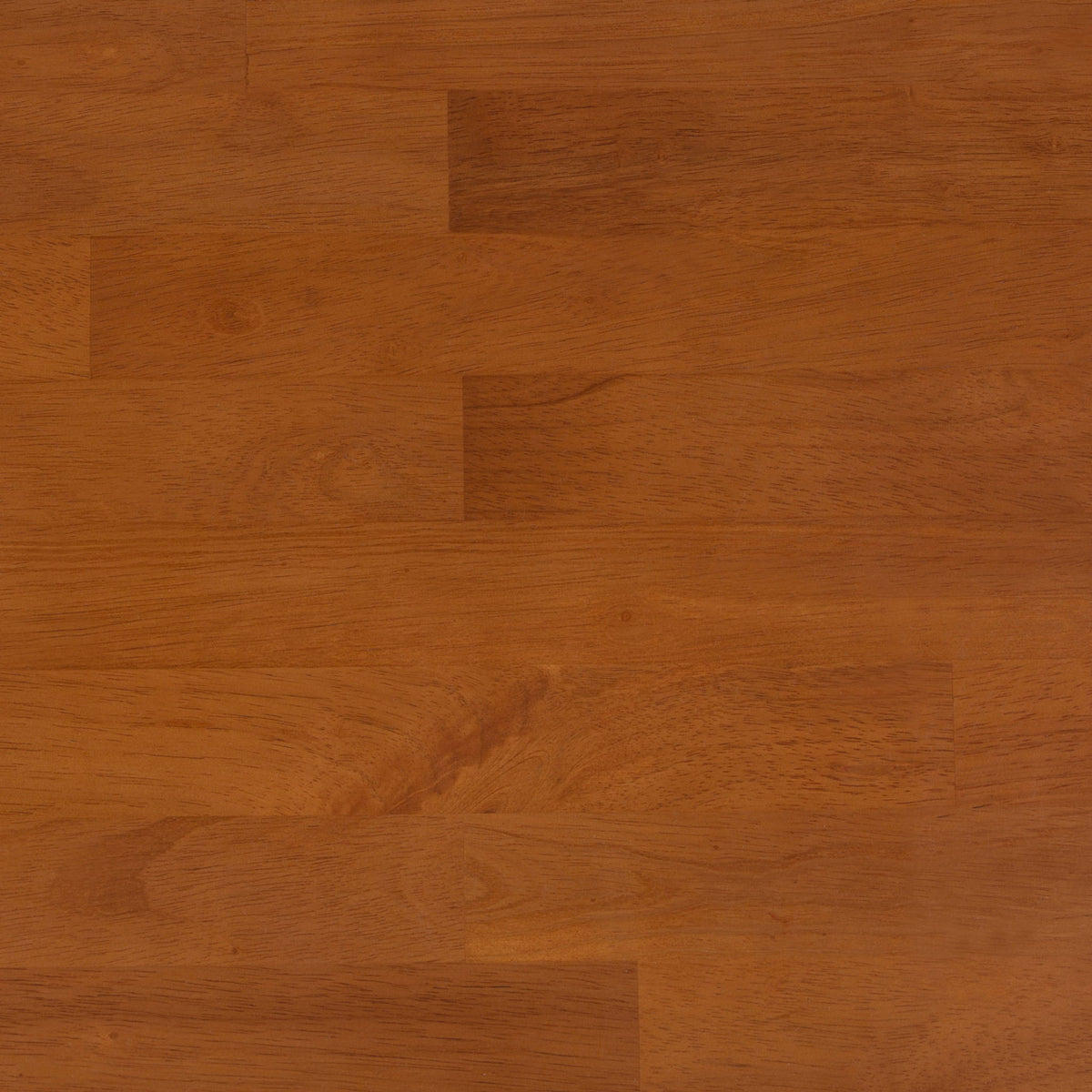 Wood grain surface close-up with patchwork plank pattern in warm brown tones