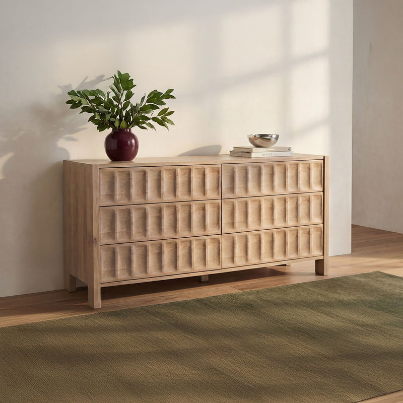 Natural wood dresser with stacked drawer fronts and tapered legs