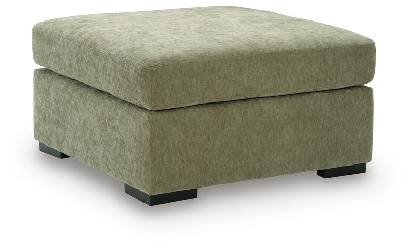 Oversized accent ottoman in green fabric with square black legs