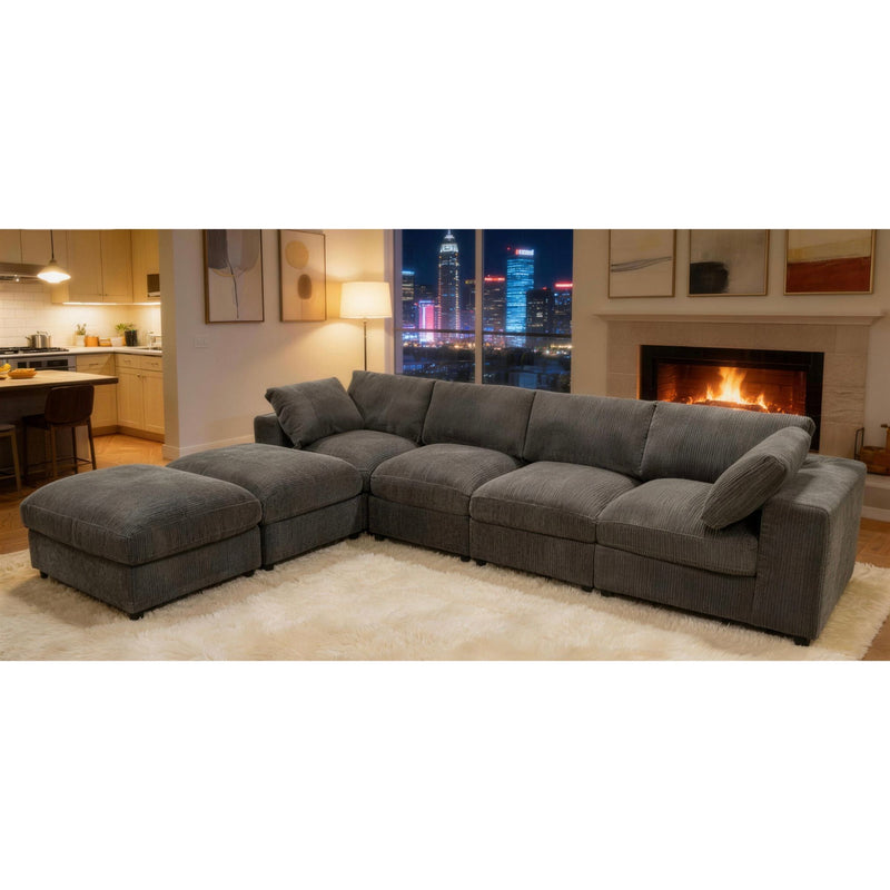 Reversible modular sectional sofa in dark gray, left chaise with modular seat sections