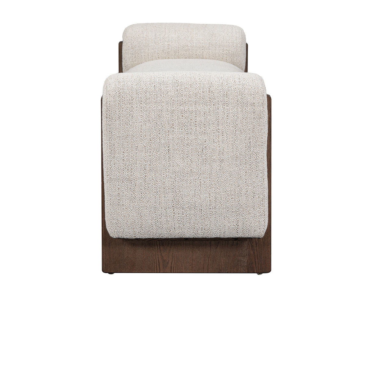 Upholstered bench end view with rounded arm, light sand fabric and dark wood legs