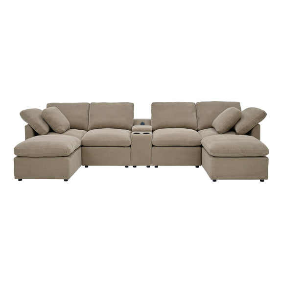 Front view of a light brown symmetrical sectional with central cup holders