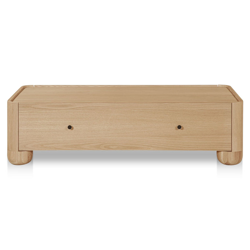 Natural wood coffee table front view with one drawer and rounded feet