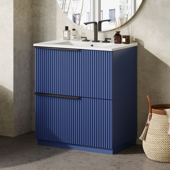 Blue fluted freestanding vanity with ceramic sink and side view of cabinet doors