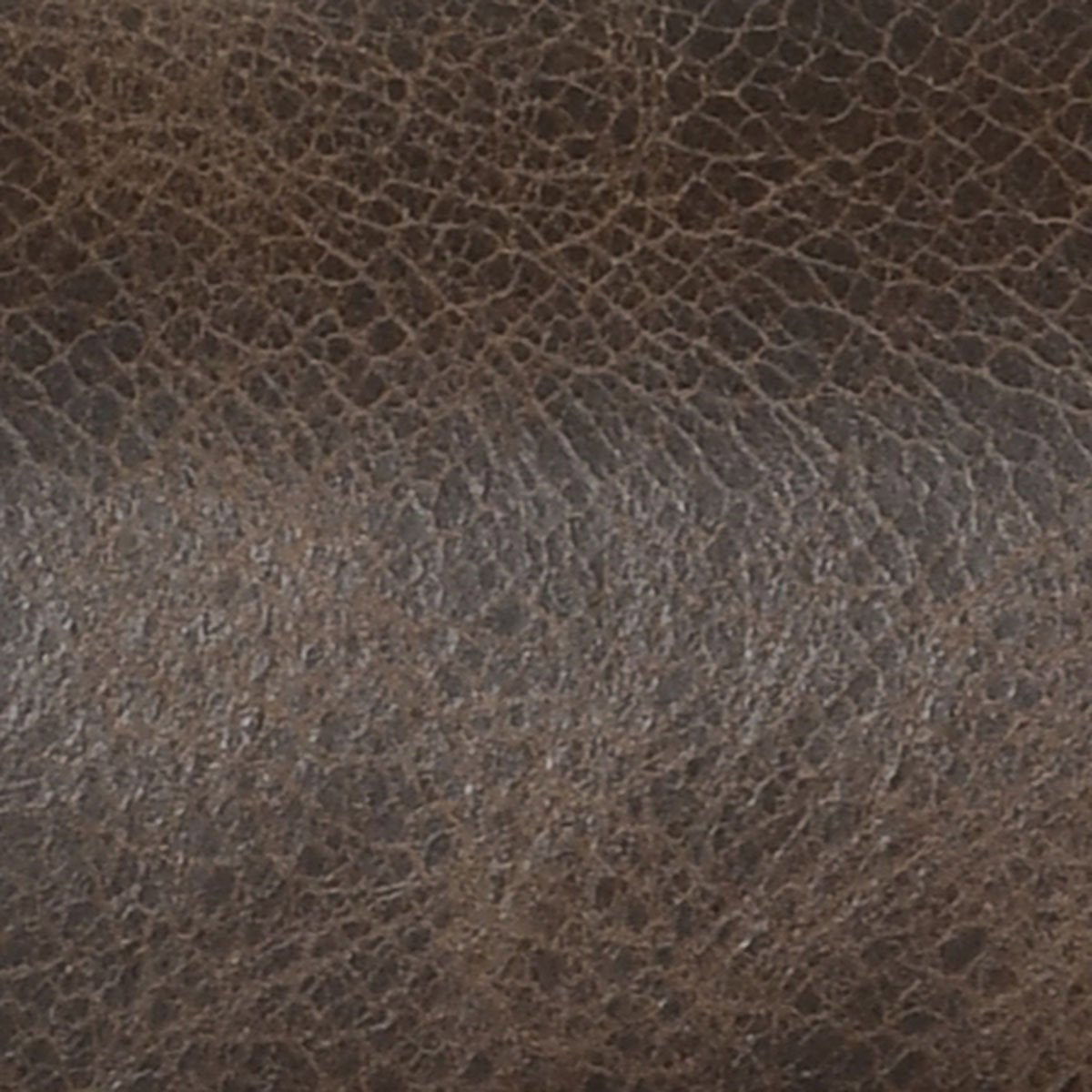 Dark brown leather upholstery texture close-up with fine grain finish