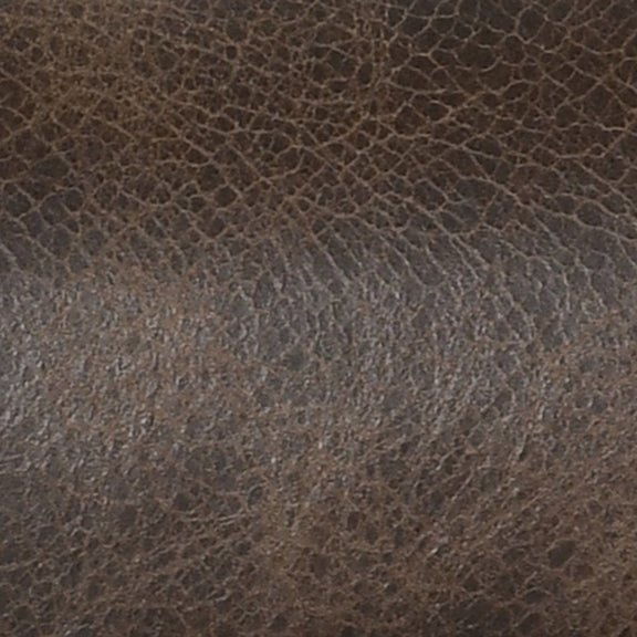 Dark brown leather upholstery texture close-up with fine grain finish