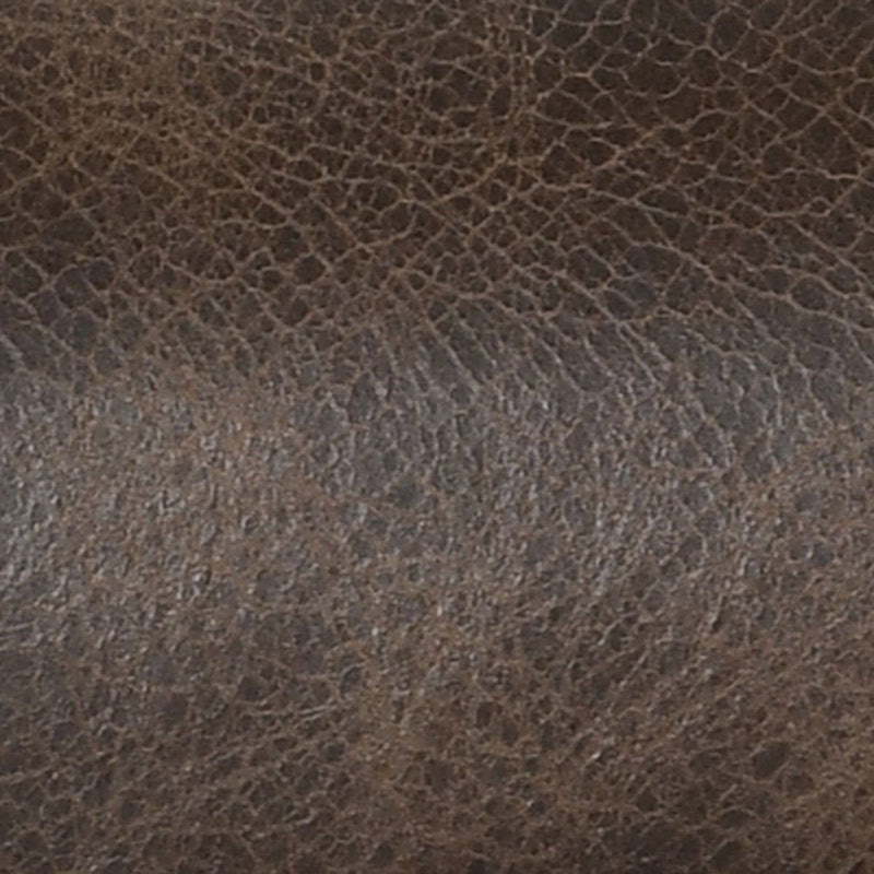 Dark brown leather upholstery texture close-up with fine grain finish