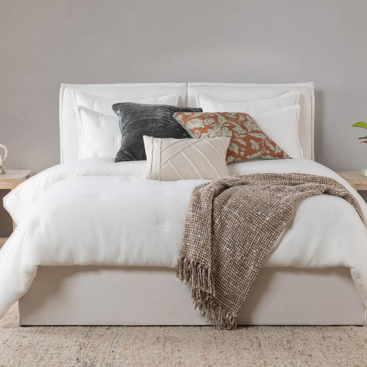 Cloud comforter sham on bed, square solid white with envelope seam