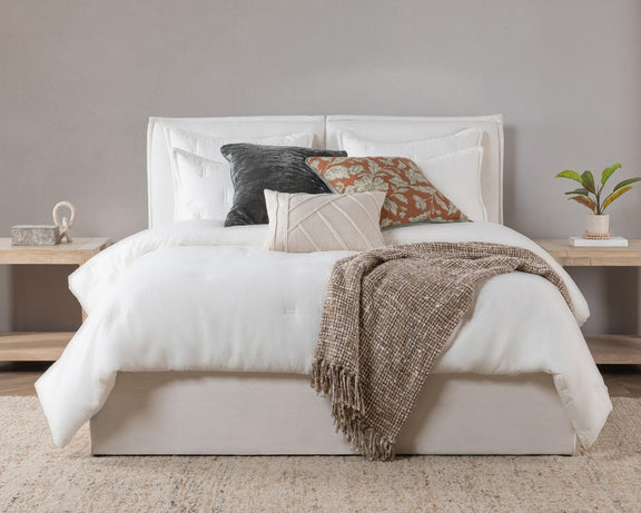 Cloud comforter sham on bed, square solid white with envelope seam
