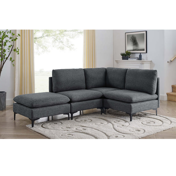 Dark gray modular sectional sofa with chaise and ottoman seats, tall legs