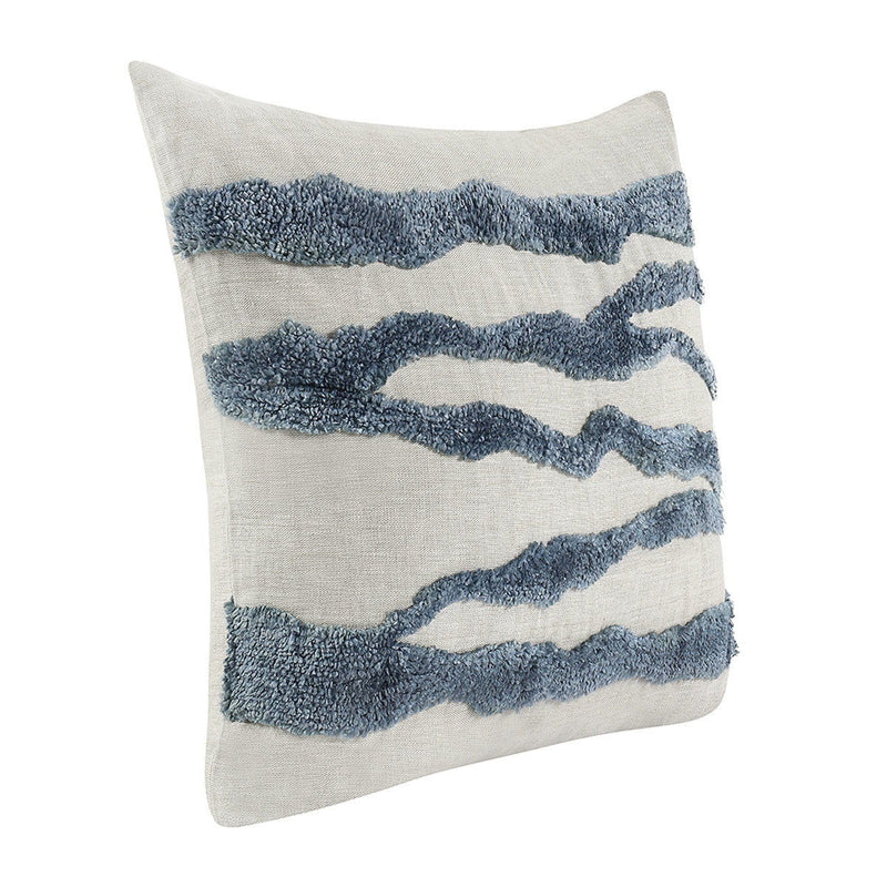 Light neutral decorative pillow with blue textured wavy stripe pattern