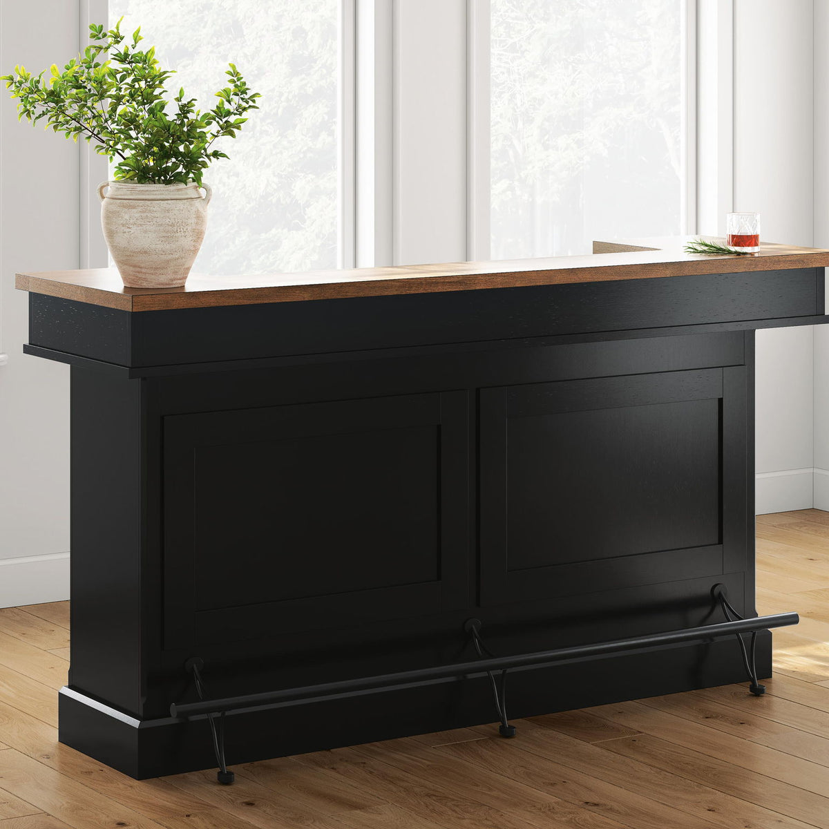 Black bar cabinet with brown wood top, two doors, and black legs