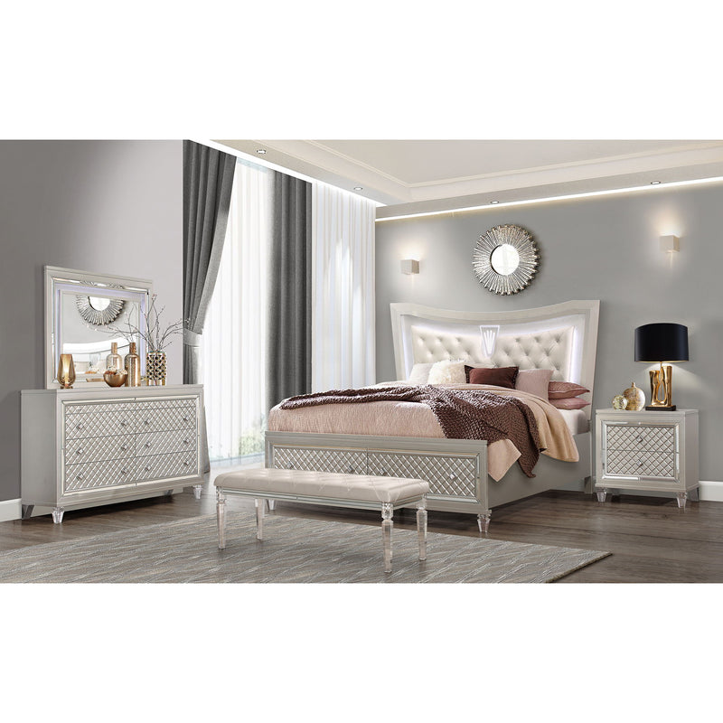 Champagne dresser with diamond cross-pattern doors, raised legs, and smooth top