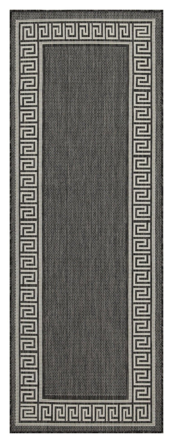 Indoor/outdoor area rug with dark gray Greek key border and solid center