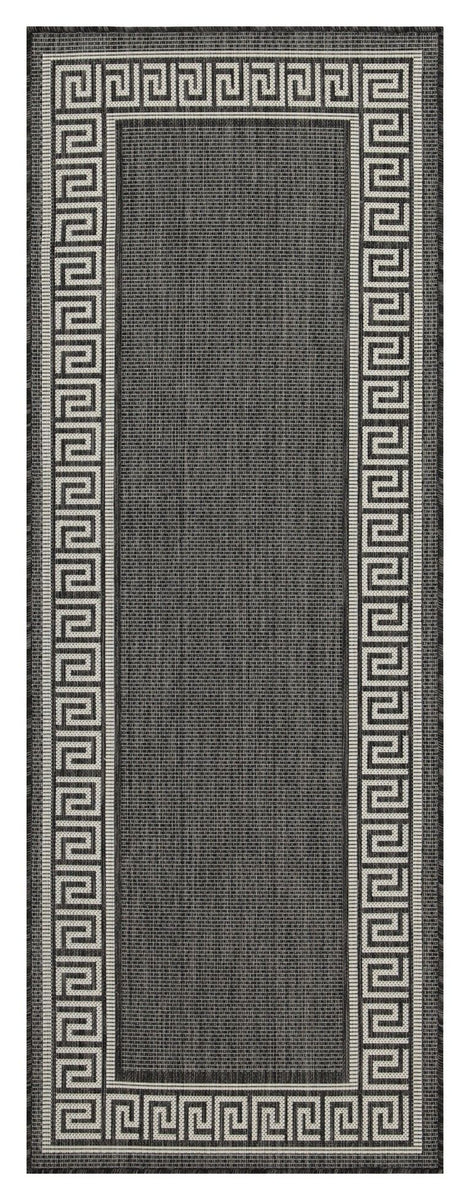 Dark charcoal area rug with cream Greek key border and vertically striped center.
