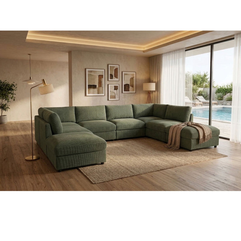 Dark green modular sectional sofa with two ottomans, open corner chaise layout