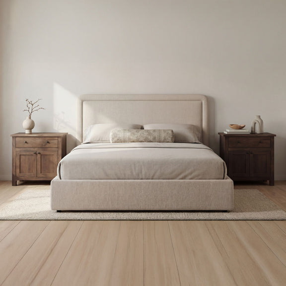 Light beige king upholstered bed with tall headboard and slatted base