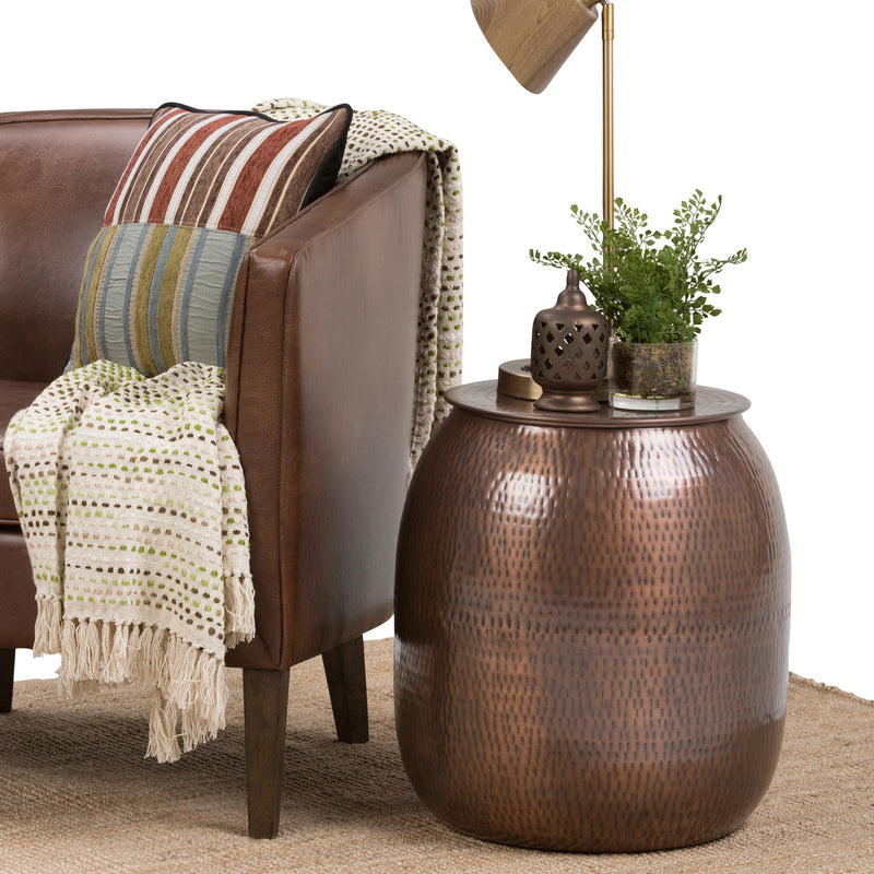 Handcrafted metal storage accent table with round bronze dome lid and barrel base
