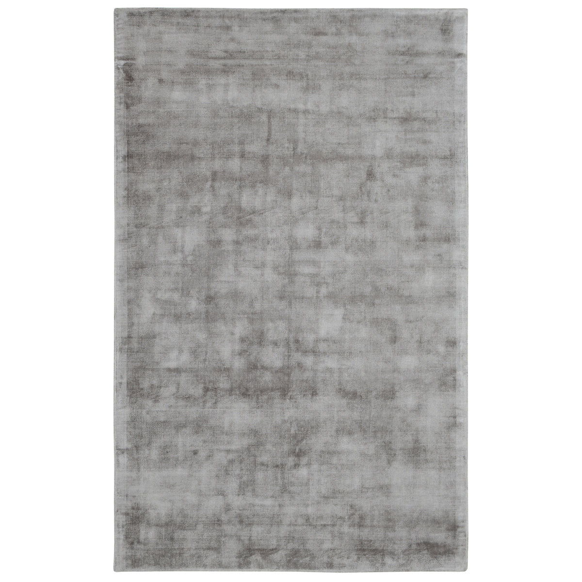 Light gray distressed area rug with soft mottled pattern texture