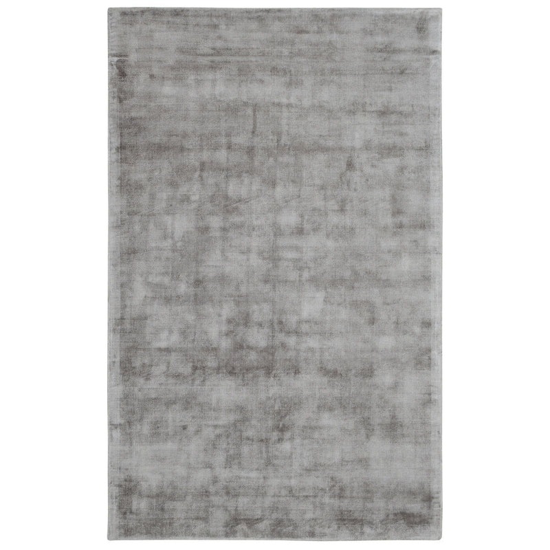 Light gray distressed area rug with soft mottled pattern texture