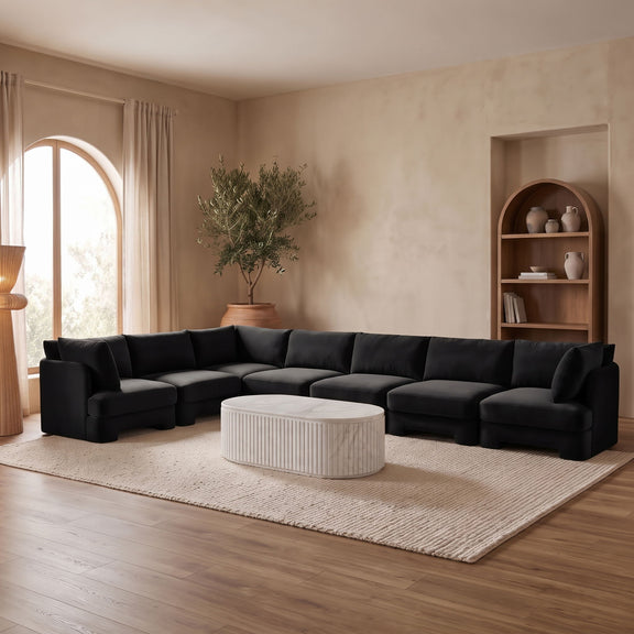 Black upholstered 7-piece sectional sofa with chaise and corner seats