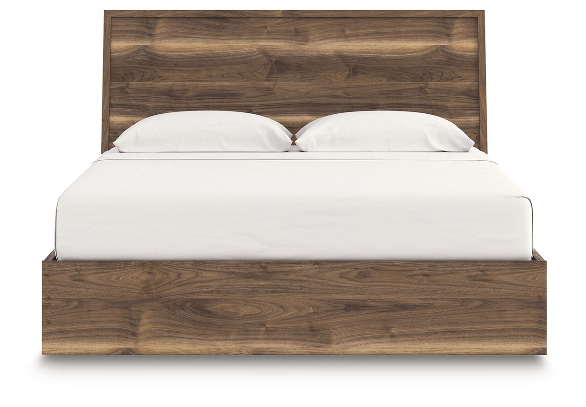Dark brown panel bed with storage base, white mattress and two pillows on headboard