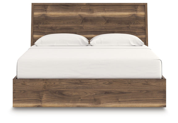 Dark brown panel bed with storage base, white mattress and two pillows on headboard