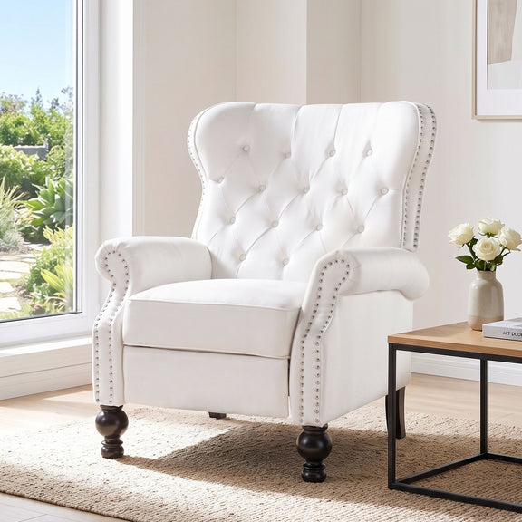 Purple tufted recliner chair with studded trim and curved armrests.