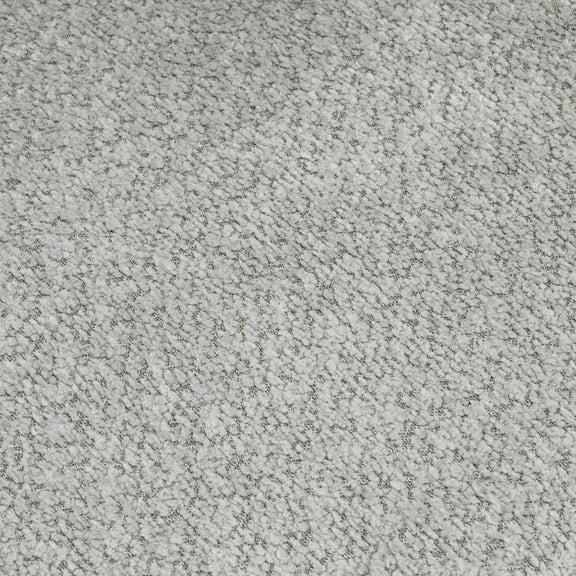 Gray textured upholstery fabric close-up with dense speckled pile
