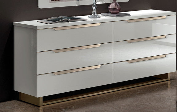 White double dresser with countertop, sink and faucet, six drawers with bar pulls