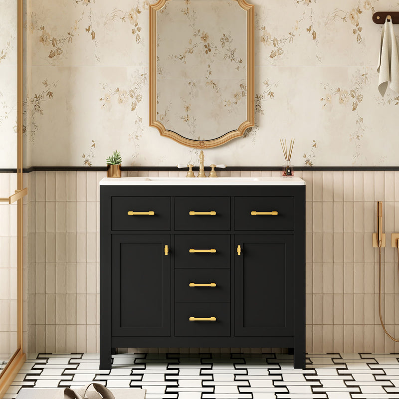 Black bathroom vanity with white sink, four drawers, two doors, and gold-tone pulls