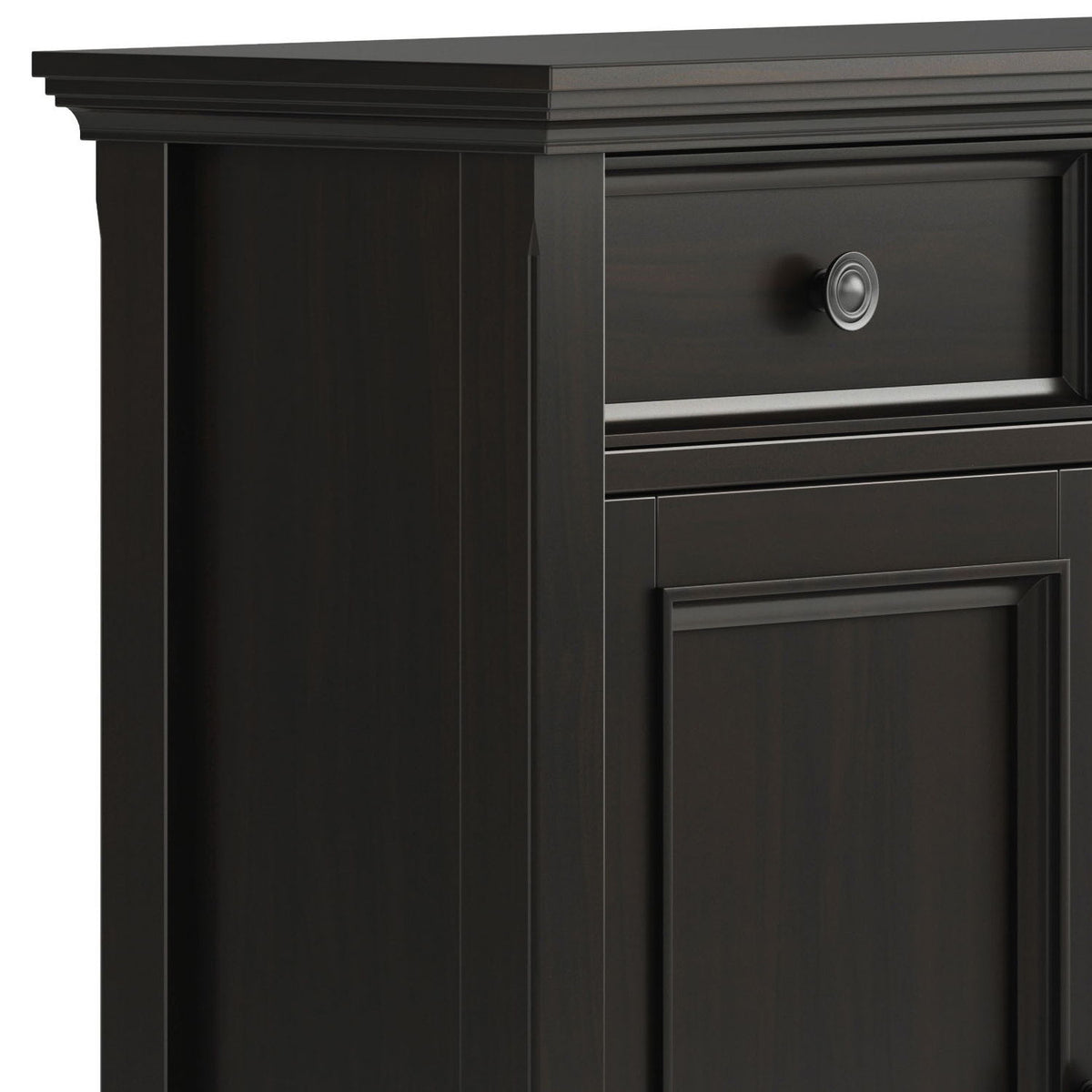 Close-up of the Amherst cabinet's drawer pull, paneled door, and layered top