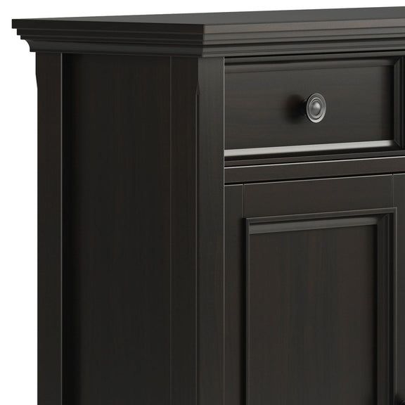 Close-up of the Amherst cabinet's drawer pull, paneled door, and layered top