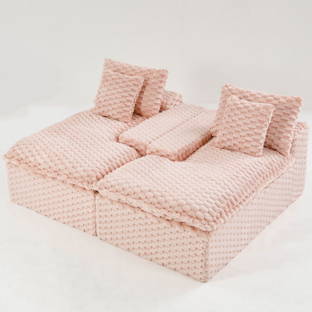 Pink double chaise lounge with textured fabric and two back cushions