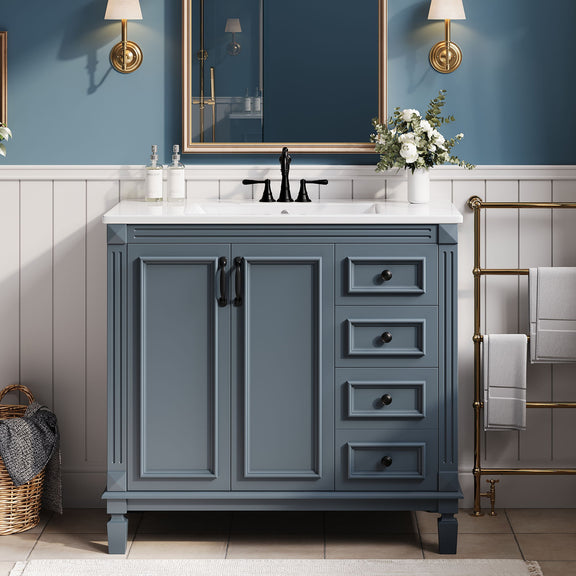 Blue bathroom vanity with white sink top, two cabinet doors, and four drawers