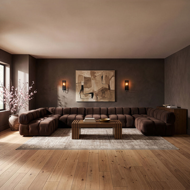 Dark brown U-shaped modular sectional sofa with tufted seats and padded back