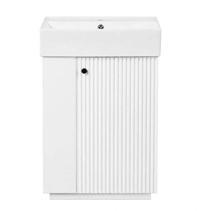White freestanding bathroom vanity with sink top and vertical ribbed cabinet doors