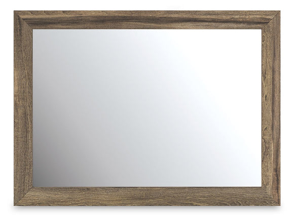 Rectangular bedroom mirror with light-brown wooden frame and clear glass