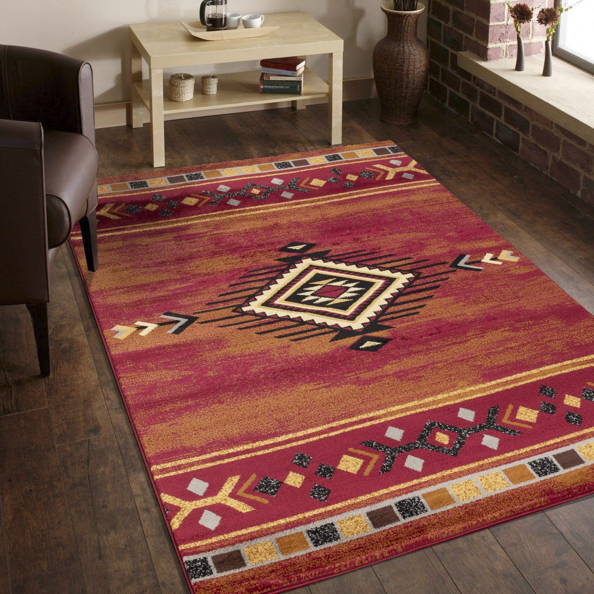 Southwest area rug in red with geometric diamond motif and colorful border