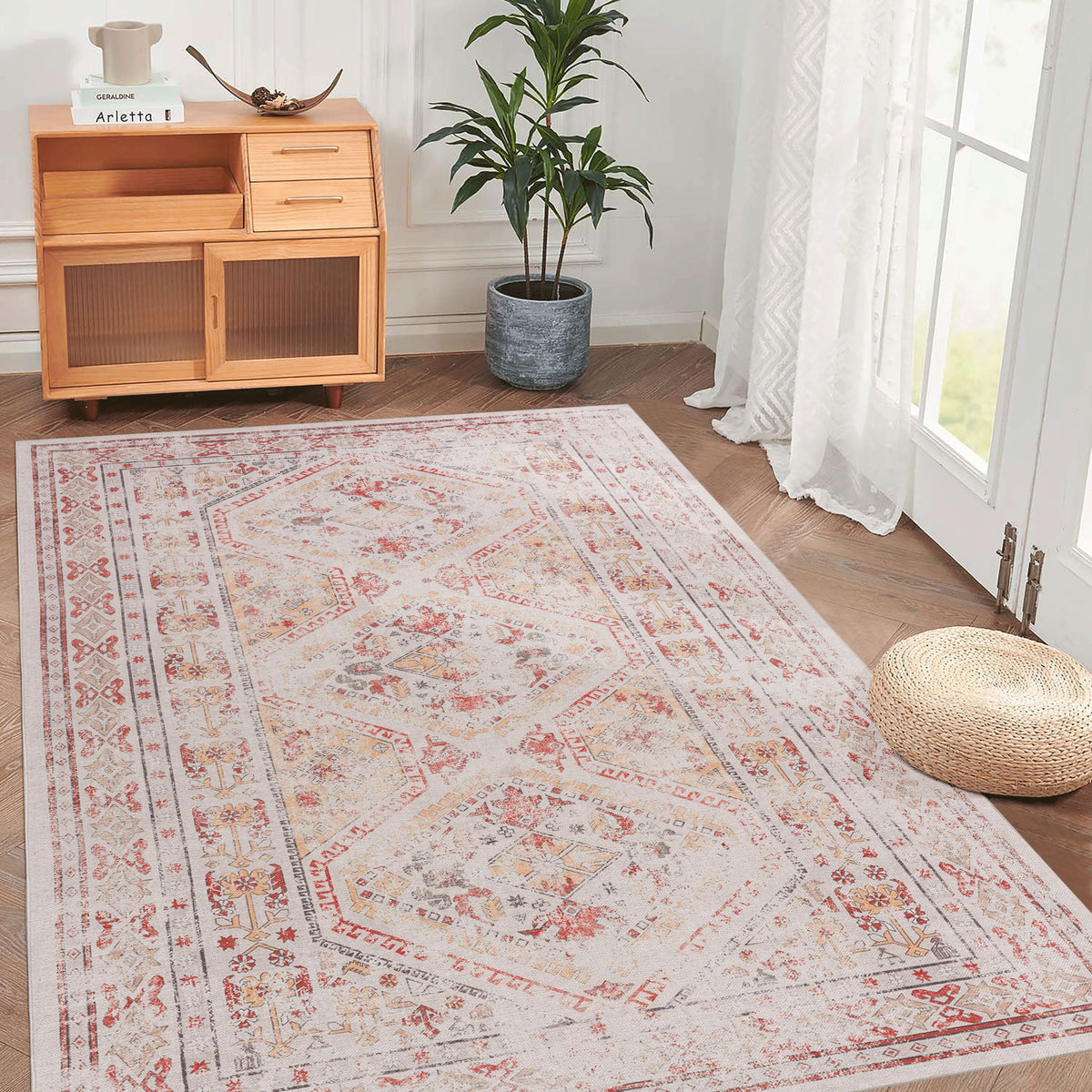 Beige washable area rug with red and gray ornate medallion border, large rectangle