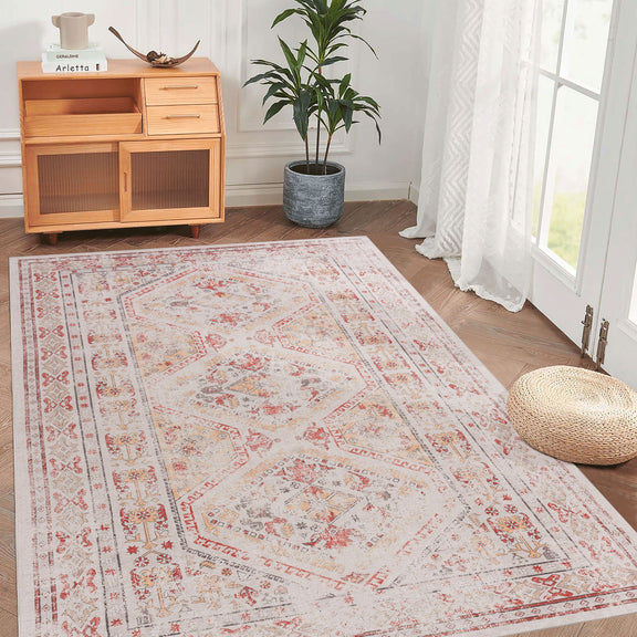 Beige washable area rug with red and gray ornate medallion border, large rectangle