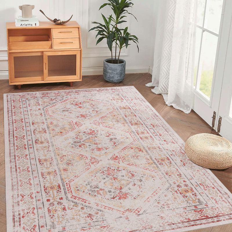 Beige washable area rug with red and gray ornate medallion border, large rectangle