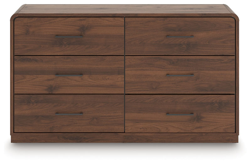 Dark brown wood dresser with four wide drawers and metal bar pulls