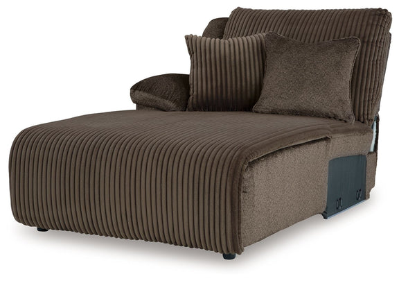 Dark brown ribbed reclining sectional sofa with chaise and padded armrest head pillow