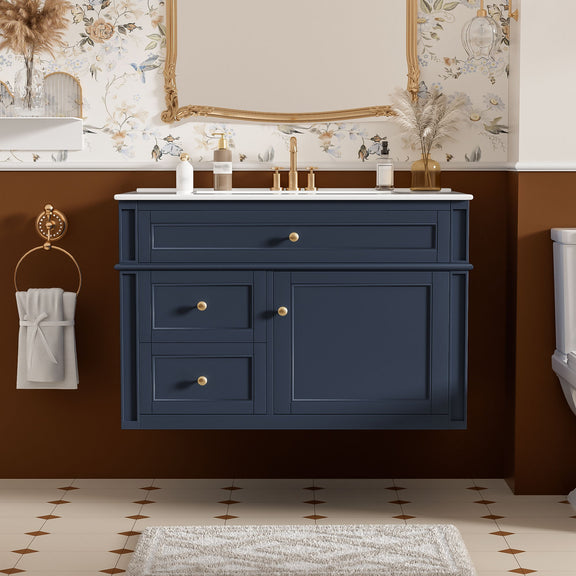 Blue wall-mounted bathroom vanity with white sink, two drawers, and tip-out drawer